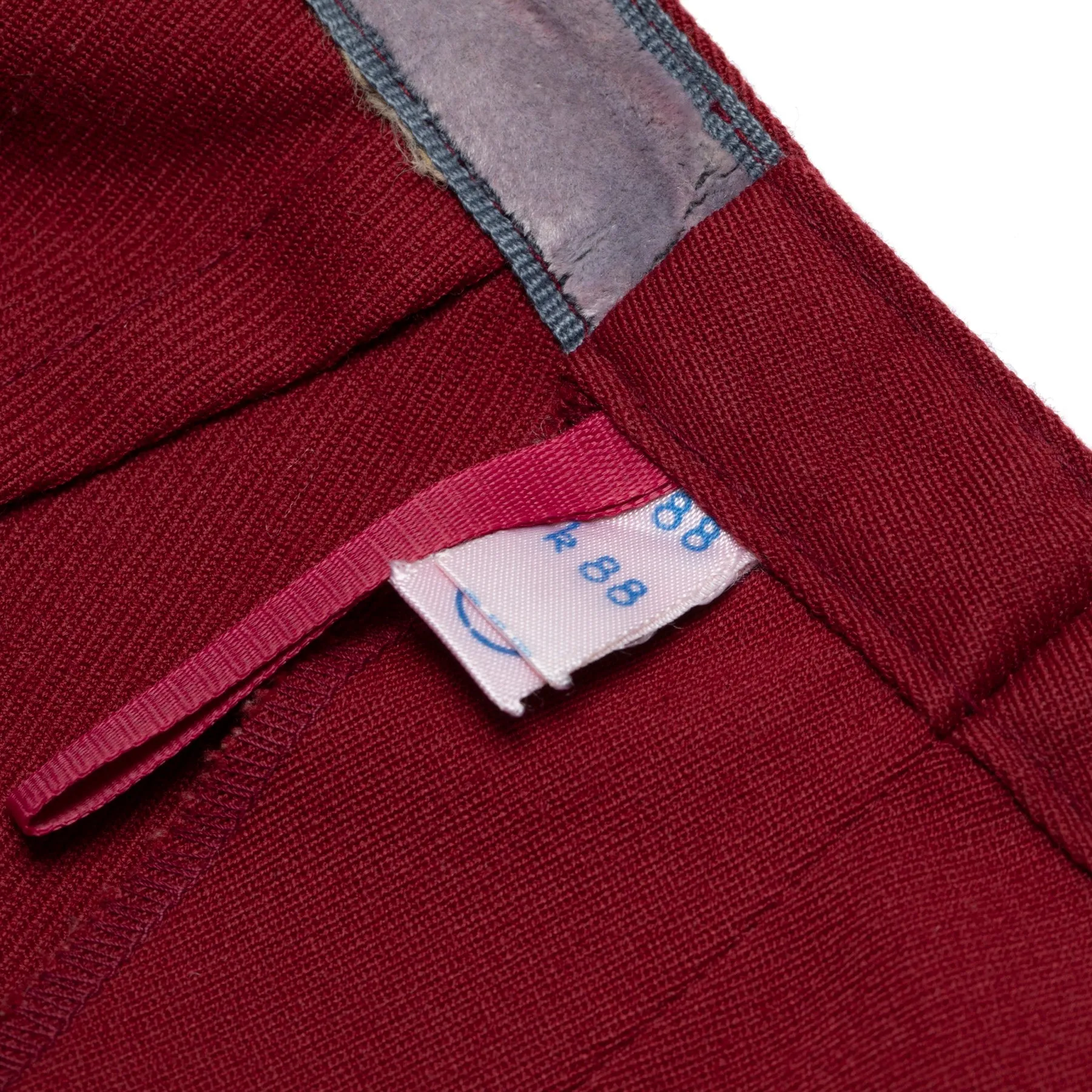 High-Twist Twill, Structured Drape, Felt-Lined Waistband, Pressed Pleats